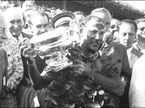 Стирлинг Мосс, победитель Гран При Великобритании'55
