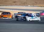 Зак Браун на трассе в Монтерее за рулём исторического спорткара Porsche 962