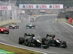 Пилоты Caterham F1 Виталий Петров и Хейкки Ковалайнен на трассе Гран При Бразилии