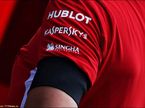 Траурная лента на униформе сотрудников Ferrari