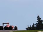 Себастьян Феттель за рулём Ferrari на трассе в Спа