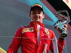 Шарль Леклер на подиуме в Сильверстоуне, фото пресс-службы Ferrari